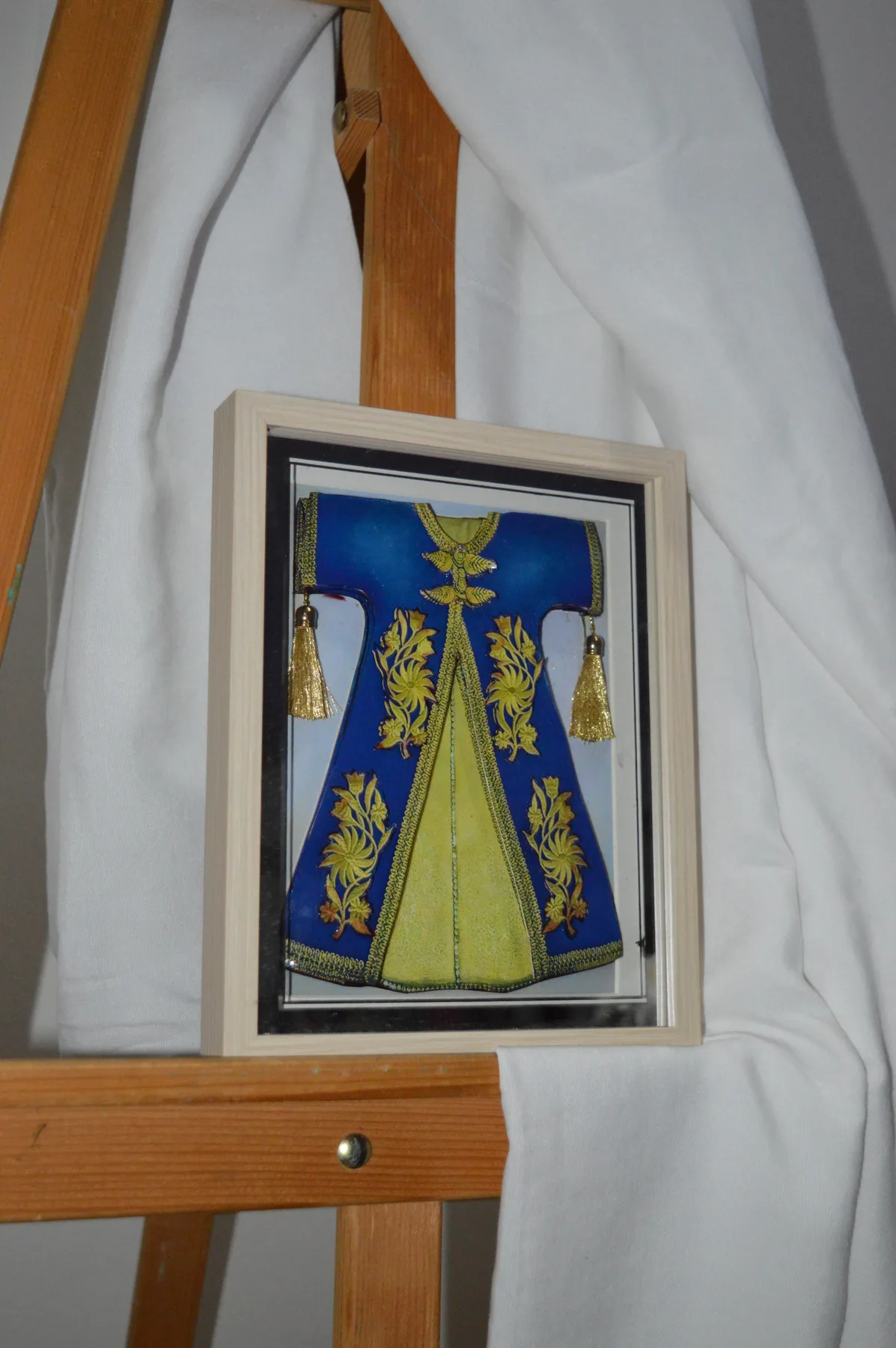 Blue framed traditional paper relief tableau